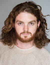 Headshot of male international MFA acting student