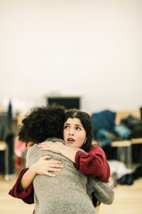 Two female students hugging